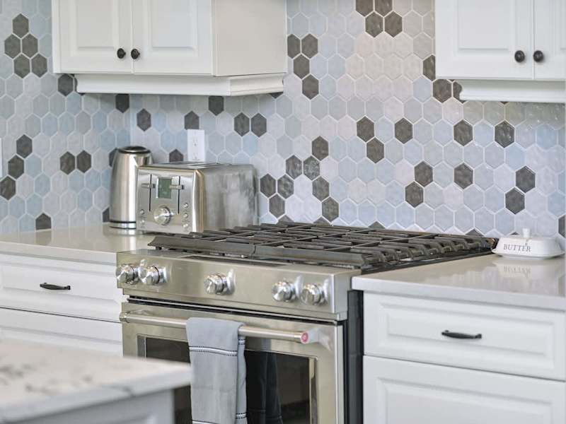 Fully equipped modern kitchen with amazing views on the main floor.