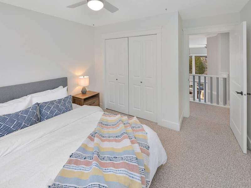 Top floor third bedroom with queen bed.