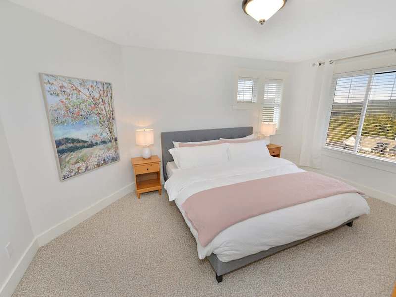 Top floor fourth bedroom with king bed.