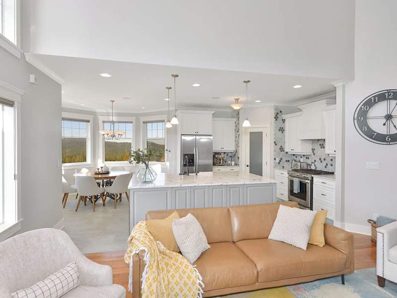 Fully equipped modern kitchen with amazing views on the main floor.