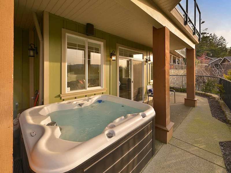 4 person hot tub with views on the lower floor with incredible views.