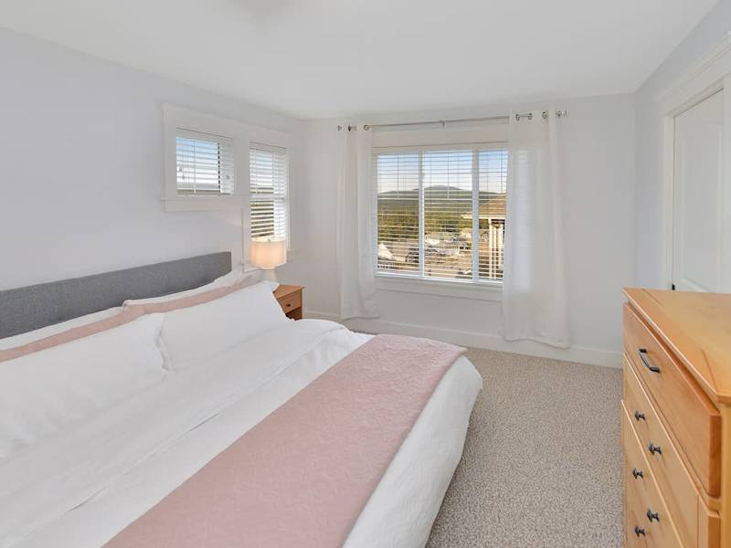 Top floor fourth bedroom with king bed.