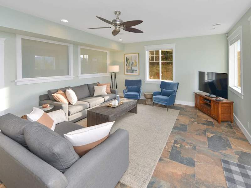 Well appointed family room on the lower floor with amazing views.