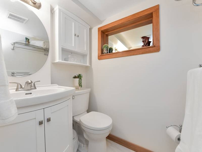 Bathroom with walk-in shower.