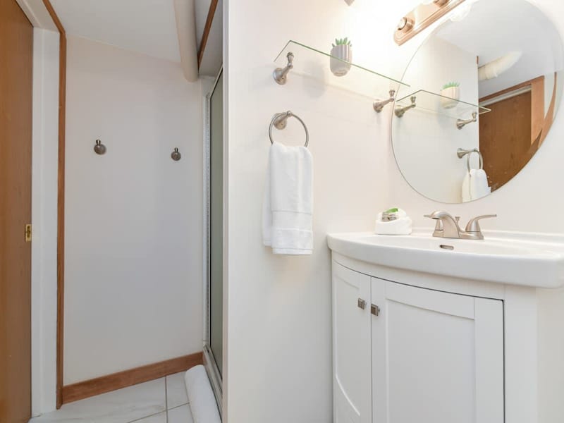 Bathroom with walk-in shower.