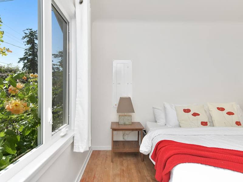 Primary bedroom in the main cottage with king bed.