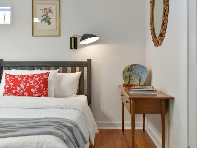 Second bedroom in the main cottage with two double beds.