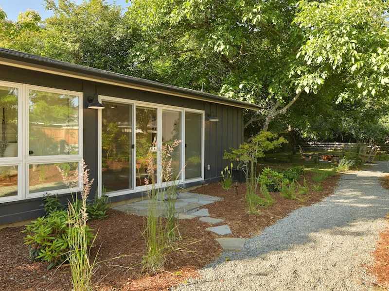 Outside the second private bedroom cottage with king bed and breakfast bar plus coffee and tea bar.