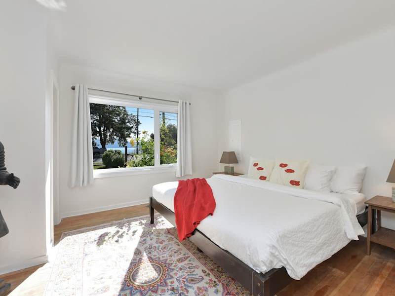 Primary bedroom in the main cottage with king bed.