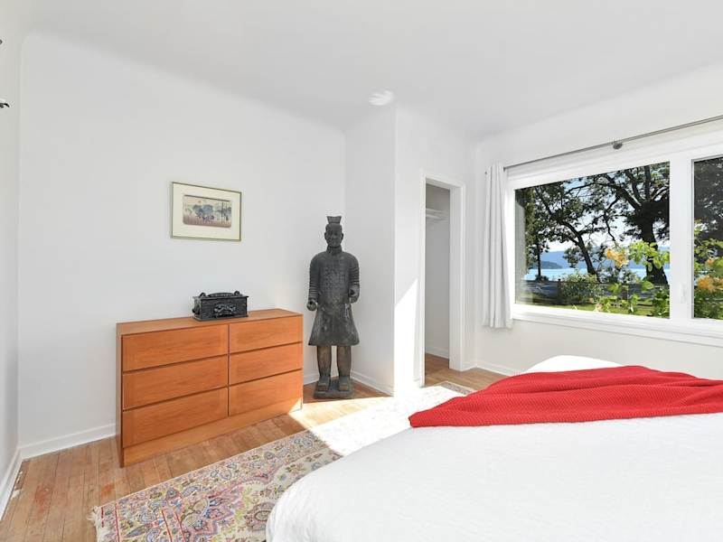 Primary bedroom in the main cottage with king bed.