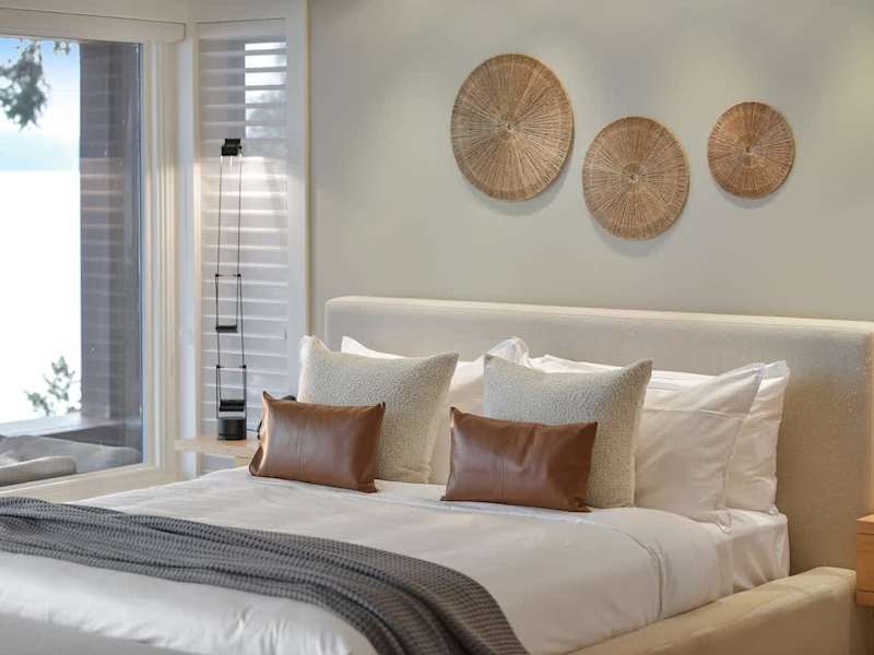 Immaculate primary bedroom with sweeping views and incredible ensuite.