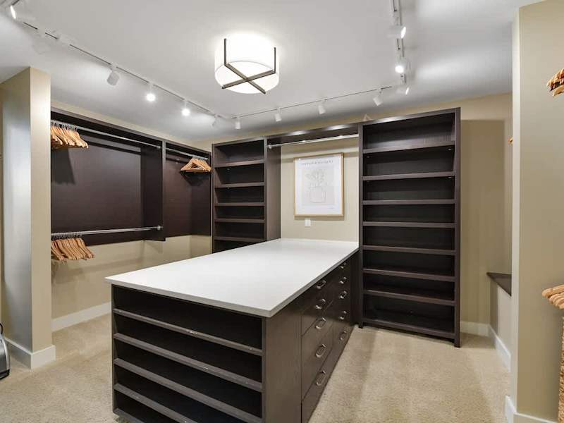 Immaculate primary bedroom with sweeping views and incredible ensuite.