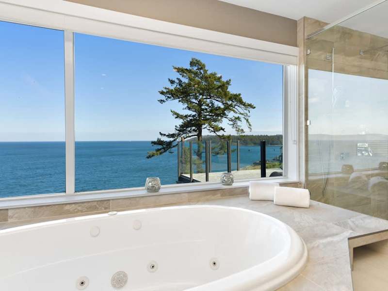 Primary bedroom second floor ensuite with spectacular views.