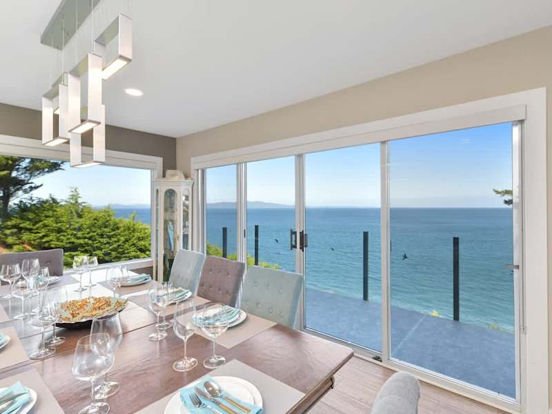 Dining room seats 8 with amazing views on the main floor.