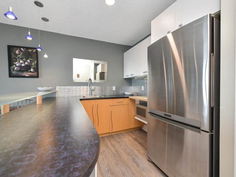 Ground floor wet bar and snack kitchen.