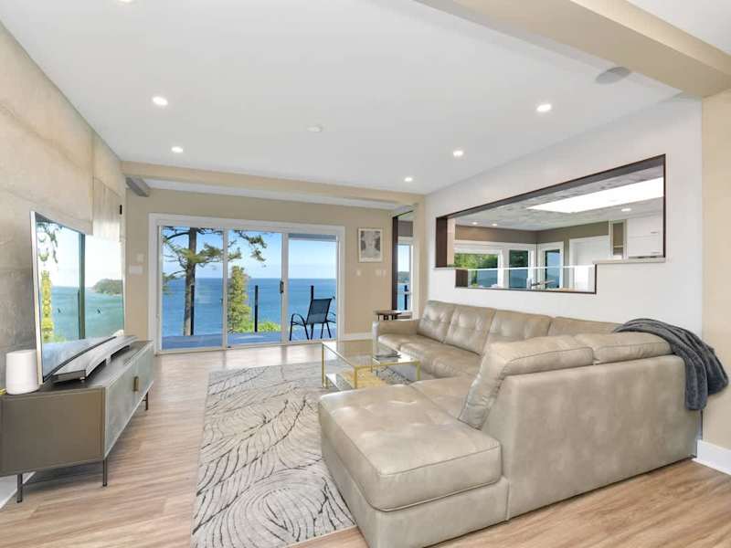 Main level media living room with ocean views.