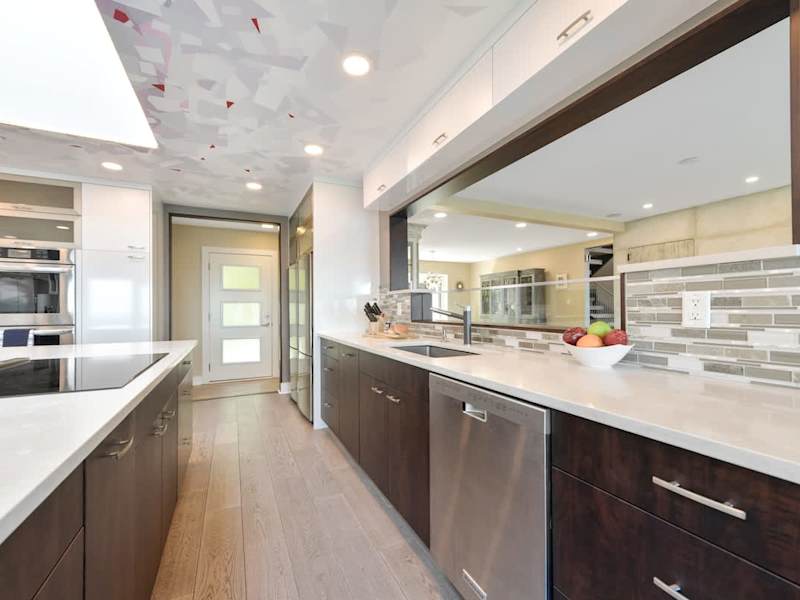 Well equipped and modern kitchen on the main level with amazing views of the ocean.