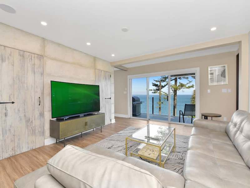 Main level media living room with ocean views.