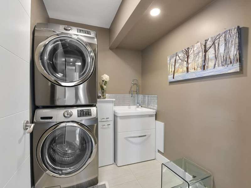 Main floor in suite laundry room.