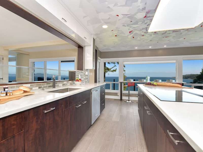 Well equipped and modern kitchen on the main level with amazing views of the ocean.