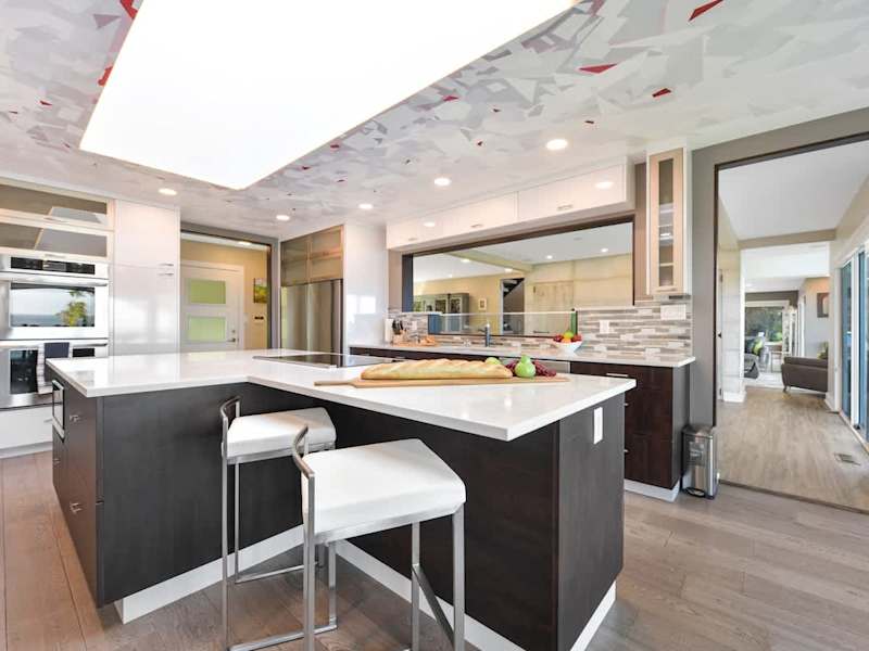 Well equipped and modern kitchen on the main level with amazing views of the ocean.