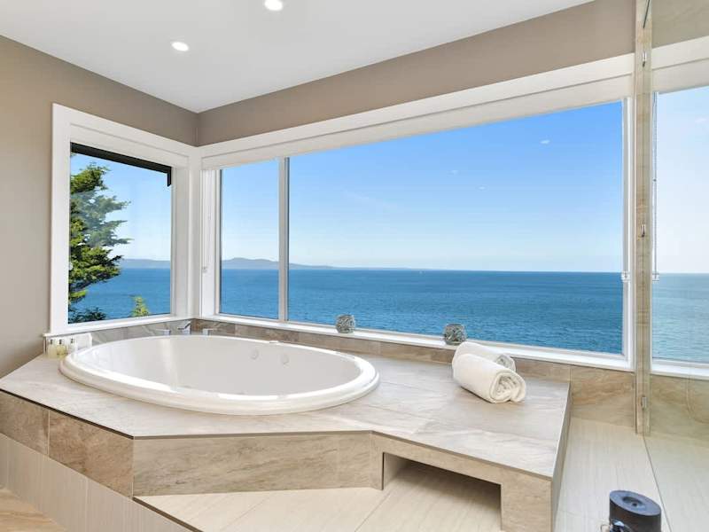 Primary bedroom second floor ensuite with spectacular views.