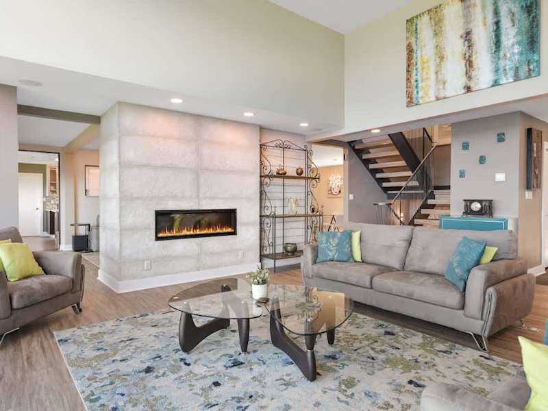 Main floor well appointed living room with spectacular views of the ocean and islands.