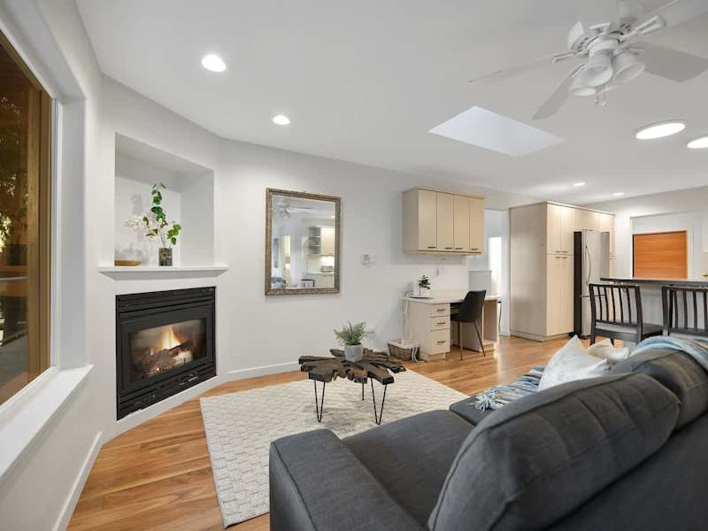 Main level addition living space near kitchen and dining room.
