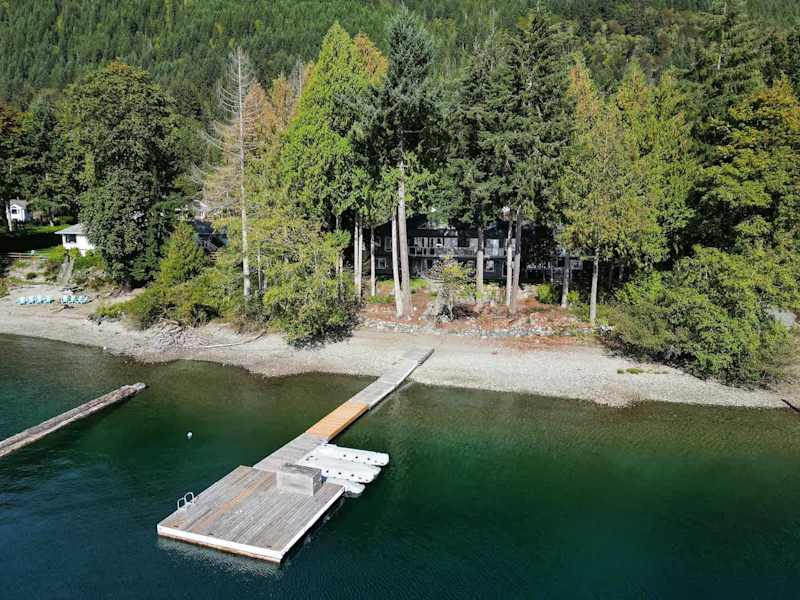 Lakeside private dock and beach.