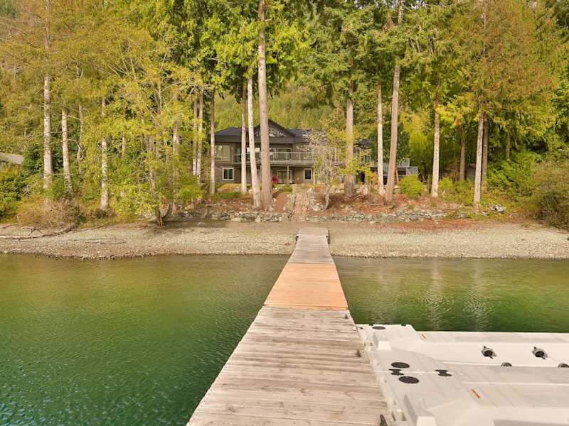Lakeside private dock and beach.