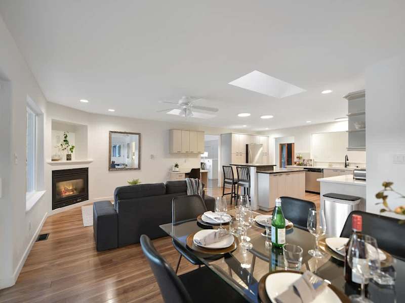 Main level dining, living and kitchen open plan.