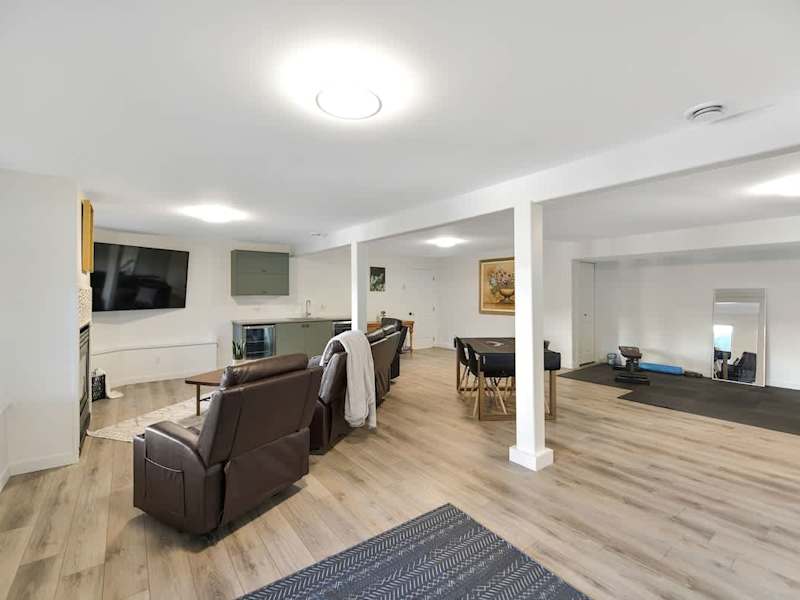 Ground level full rec-family room with workout space.