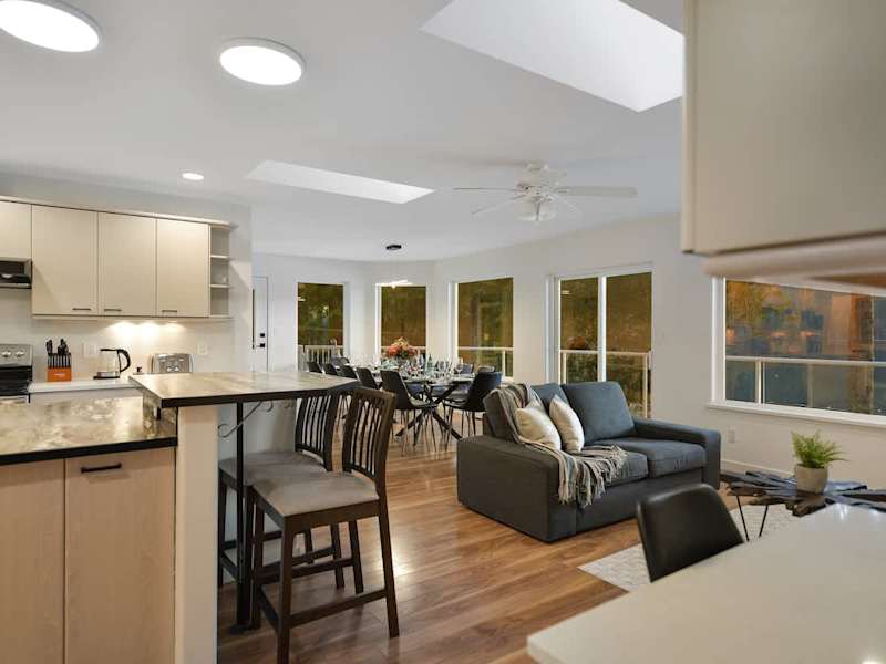 Main level dining, living and kitchen open plan.