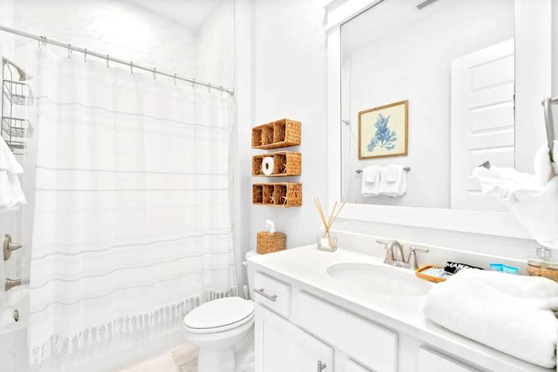 Guest hallway bathroom with shower/tub combo.