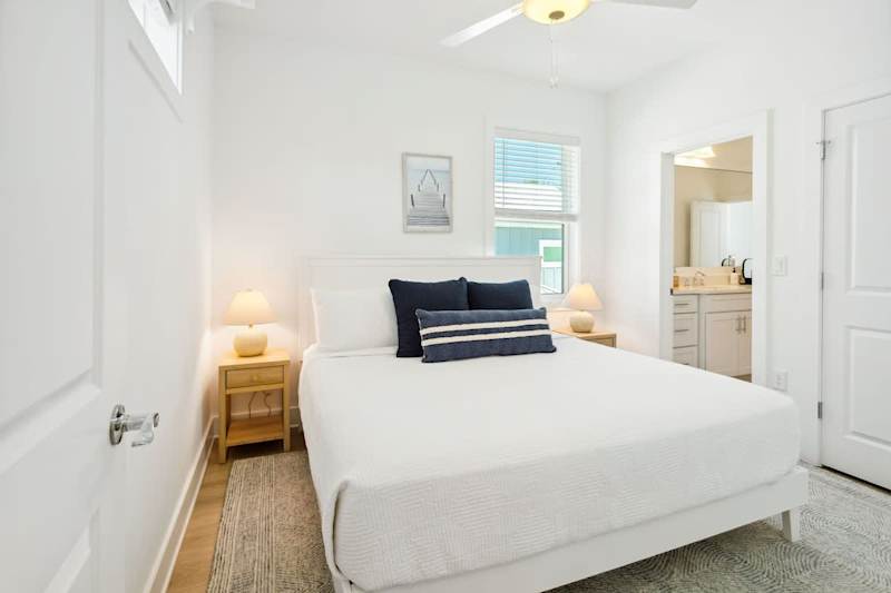 Bedroom #2 features a king bed, TV & ensuite.