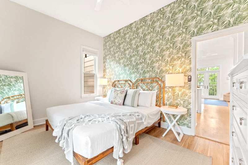 2nd floor bedroom with king bead and ensuite bathroom and balcony.