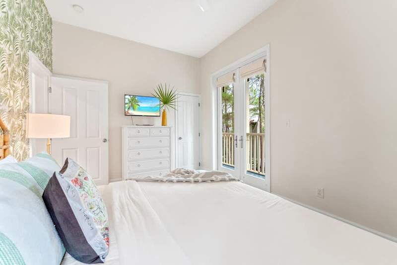 2nd floor bedroom with king bead and ensuite bathroom and balcony.