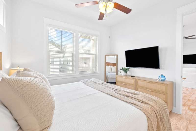 Smart TV in primary bedroom- perfect for watching movies!