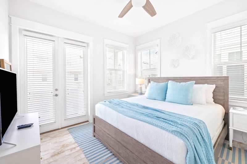 Guest bedroom features a king bed.