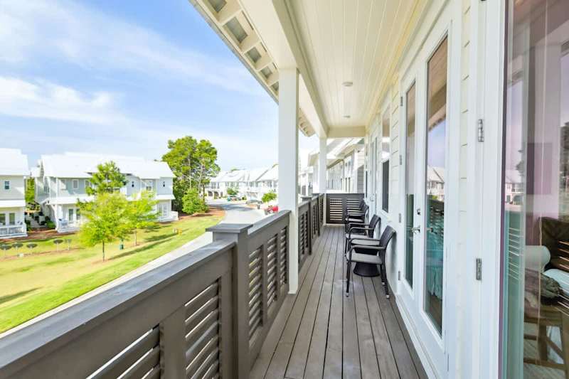 Balcony spans across the entire front of the home- perfect for watching sunrise and sunset!