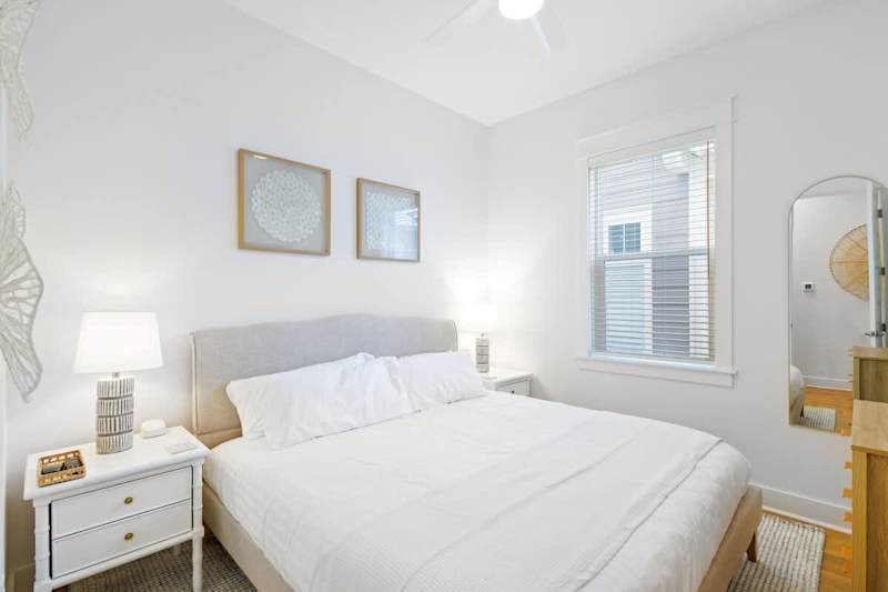 Bedroom #1 features a king bed and smart tv.