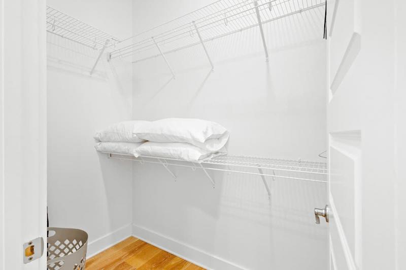 Bedroom features a large walk-in closet.