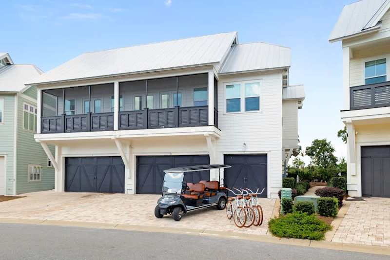 Home is on second floor with front side balcony.