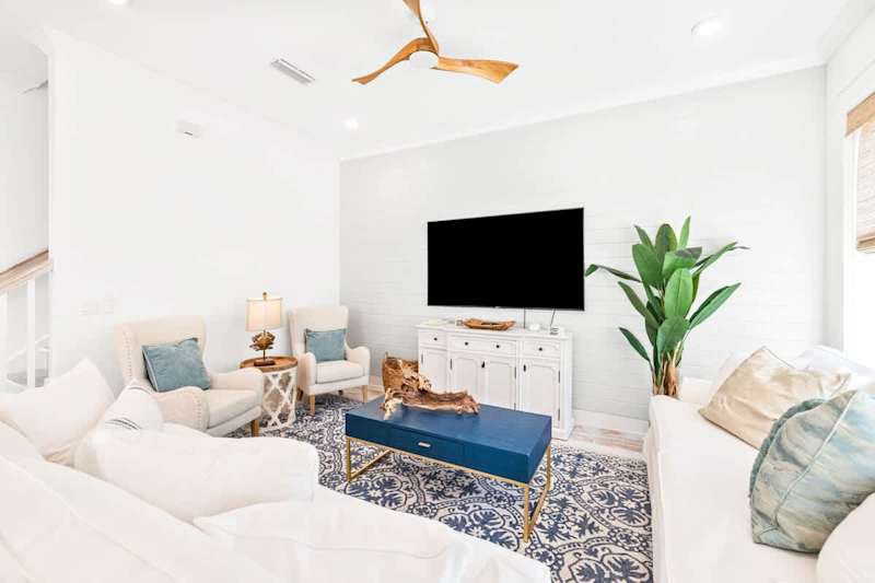 Living room features a Queen sleeper sofa.