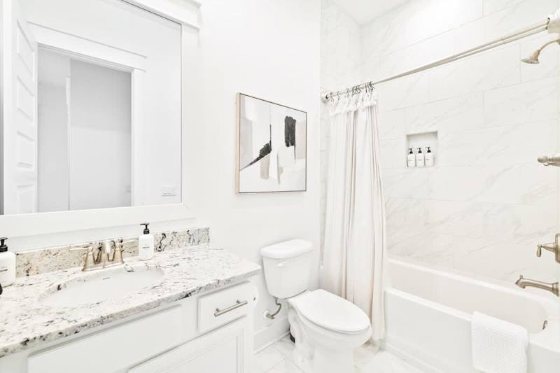 Second floor full bathroom shared by 2 bedrooms.