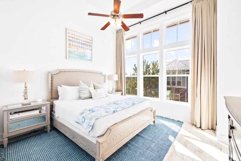Primary bedroom on second floor features large panoramic windows & a King bed!