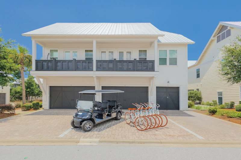 Home features a 6-seater golf cart and 6 adult bikes!