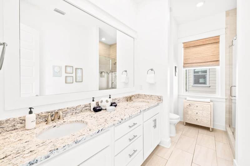 Full bathroom ensuite for primary bedroom.