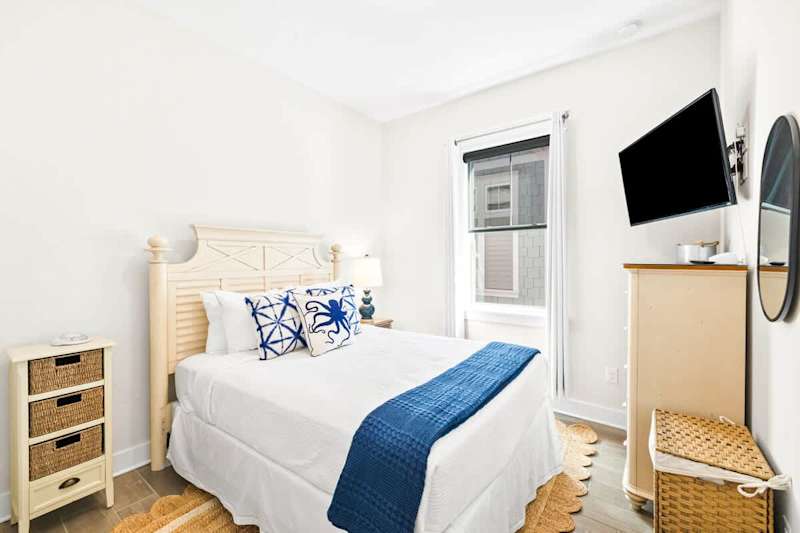 Bedroom 1 is located on second floor. Bedroom has a Queen bed & smart TV.