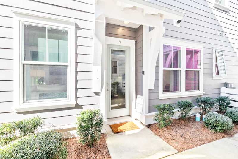 Front door entrance on left side of home.